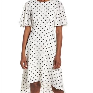 Adorable White with polka dot high low dress